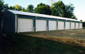 Post-frame garage with nine garage doors.