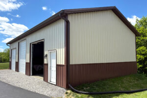 Yellow and brown post frame construction commercial building